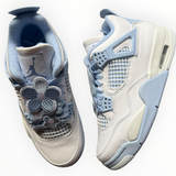 Jordan 4 Retro “Forget Me Not”